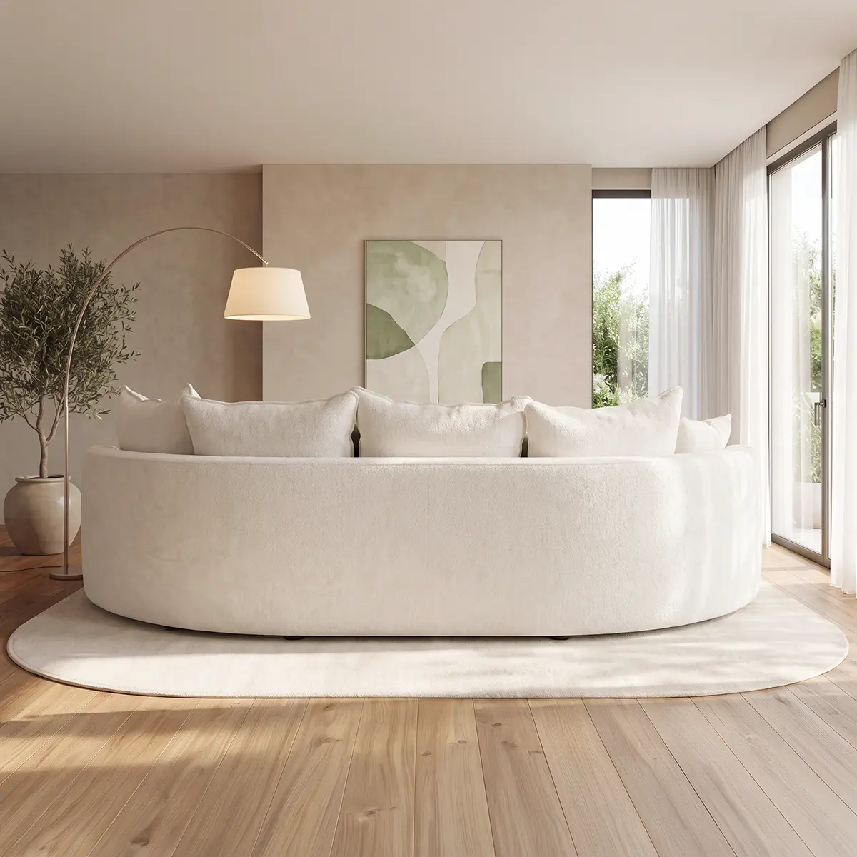 Back view of Solea curved sofa showing flowing organic silhouette