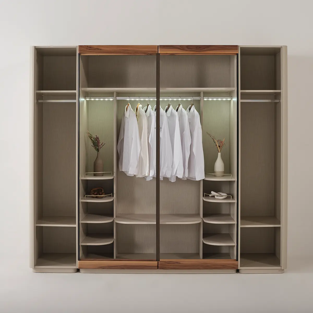 Estella wardrobe interior with LED-lit hanging rail and adjustable shelving – Asbar Furniture